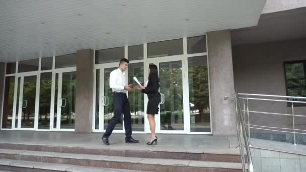 Young Beautiful Asian Business Woman Female and Caucasian Male Meet Walk on Office Building Stairs - Felvétel, videó
