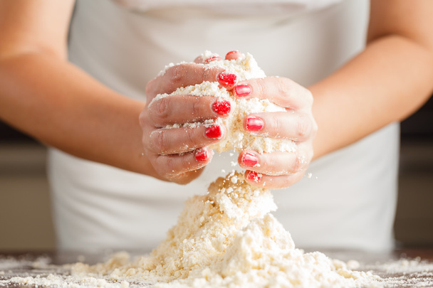 Making shortcrust pastry dough by woman's hands - Foto, Imagem