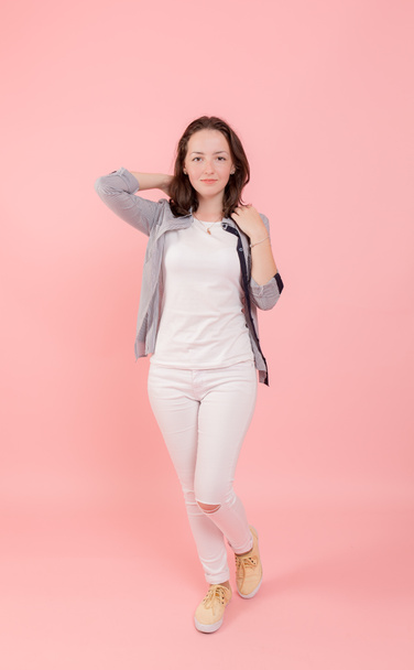 girl in white on a pink background - Foto, imagen