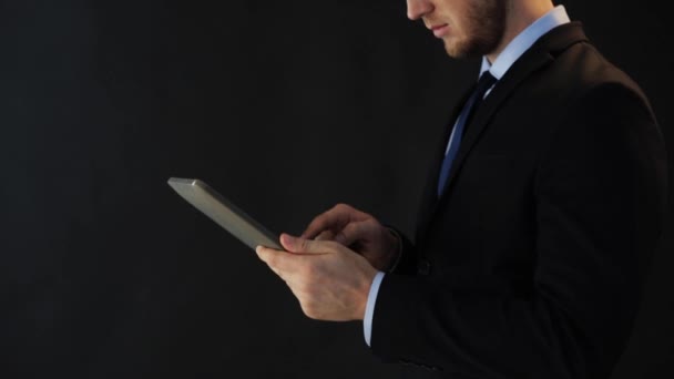 businessman in suit working with tablet pc - Metraje, vídeo