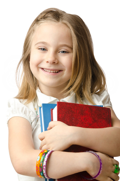 Маленькая девочка с книгами о белом
 - Фото, изображение