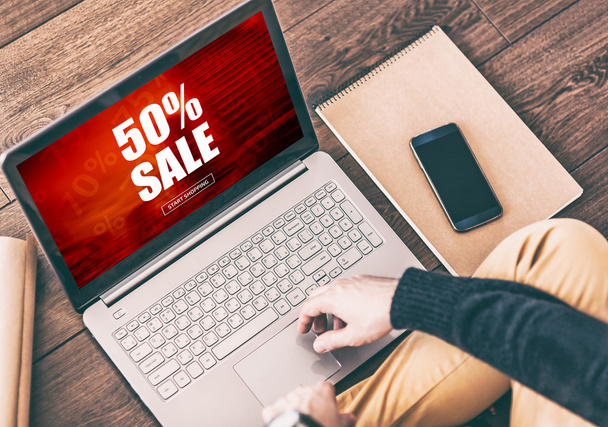 Young Businessman using Laptop. Sale Shopping concept - Foto, afbeelding