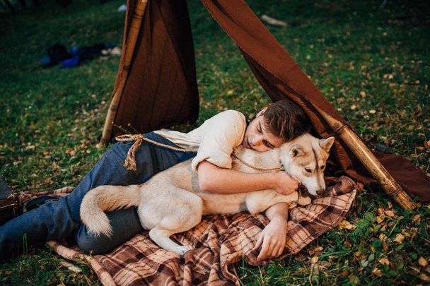 boy lying with dog  - Fotoğraf, Görsel