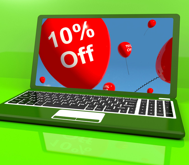 Palloncini sul computer che mostra lo sconto di vendita di dieci per cento online
 - Foto, immagini