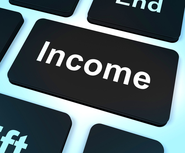 Számítógép jövedelemkulcson mutatja a jövedelmek és a bevételek - Fotó, kép