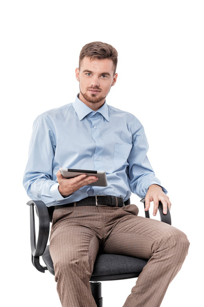 businessman  sitting in  chair and using tablet  - Φωτογραφία, εικόνα