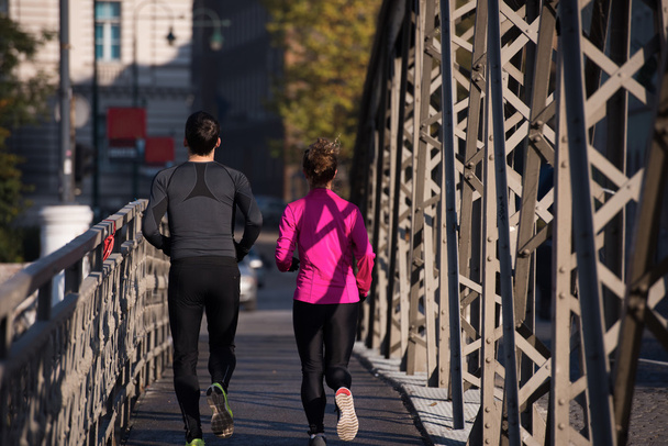 young  couple jogging - Fotografie, Obrázek