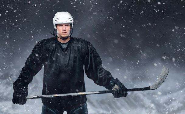 Hockey player in a snow storm. - Photo, Image