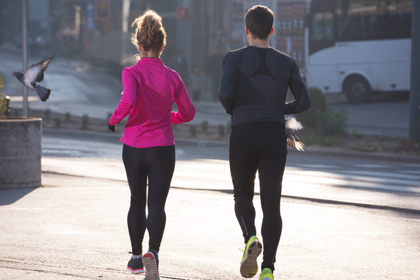 young  couple jogging - Valokuva, kuva