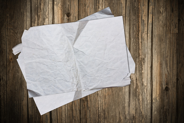 Blank old papers on a wooden background - Photo, Image