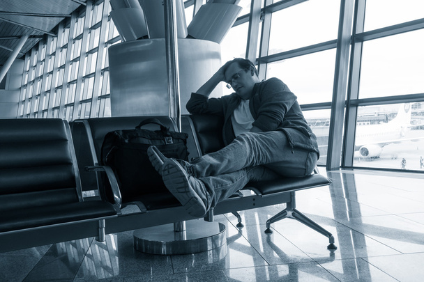 Man sleeping in the airport - Zdjęcie, obraz