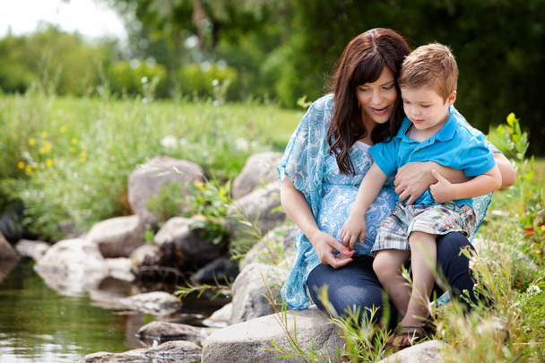 Mother and Son Playing Near Lake - Photo, image