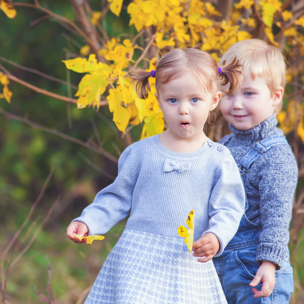 Fashion kids outdoor at fall season. Has date - Valokuva, kuva