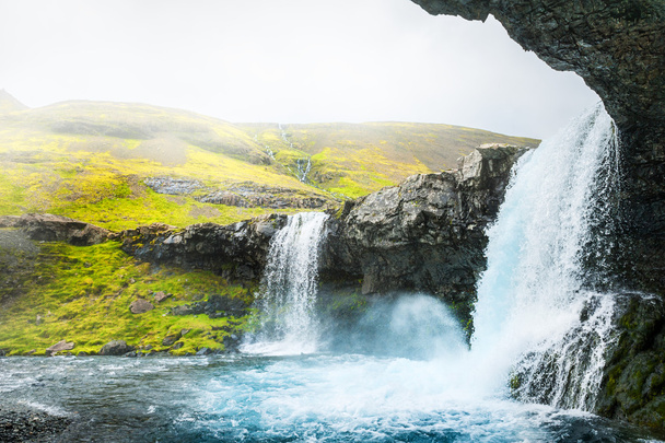 Beautiful waterfall in eastern Iceland - Fotó, kép