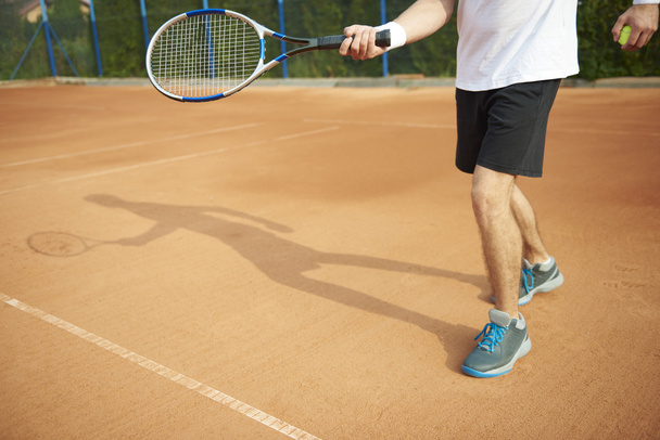 Tennis player on court - Fotó, kép
