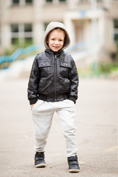 Full-length portrait of adorable little boy wearing black leathe - Foto, afbeelding