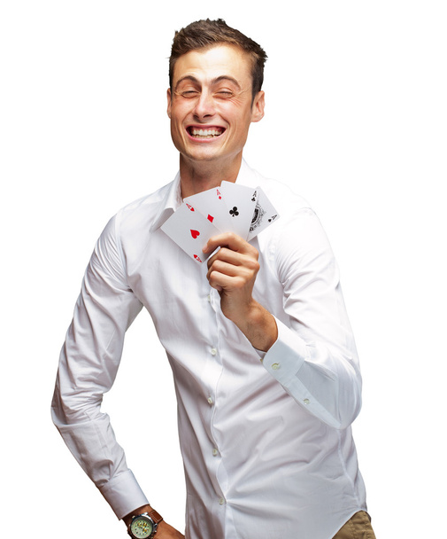 Póker kártya gazdaság fiatalember portréja - Fotó, kép