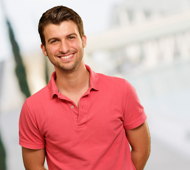Portrait of young man smiling - Fotografie, Obrázek