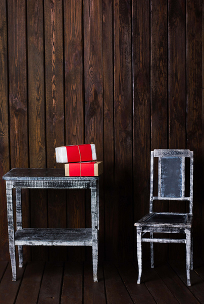Regalos de Navidad en sillón. Concepto de Navidad
 - Foto, Imagen