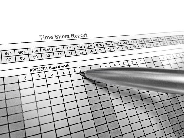 Pen point on the time sheet report - Photo, Image