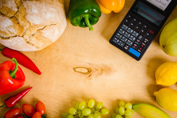 cash register and vegetables on the table - Photo, Image