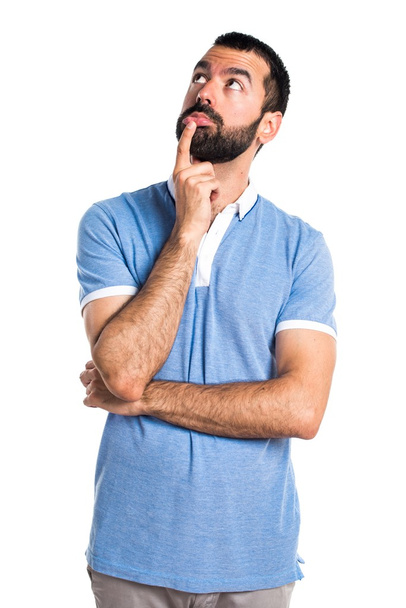 Muž s modrou košili myšlení - Fotografie, Obrázek
