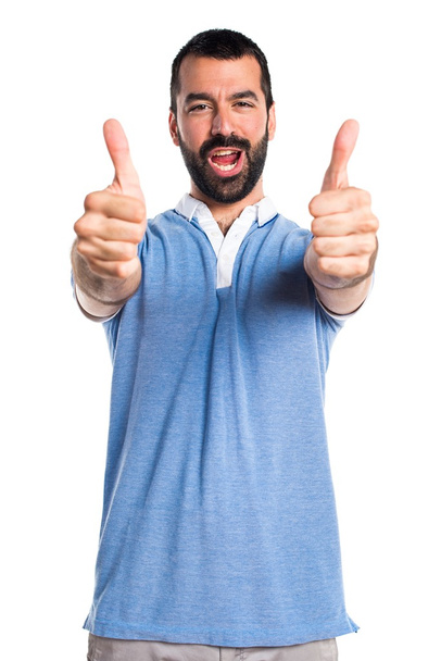 Man with blue shirt with thumb up - Foto, Imagem
