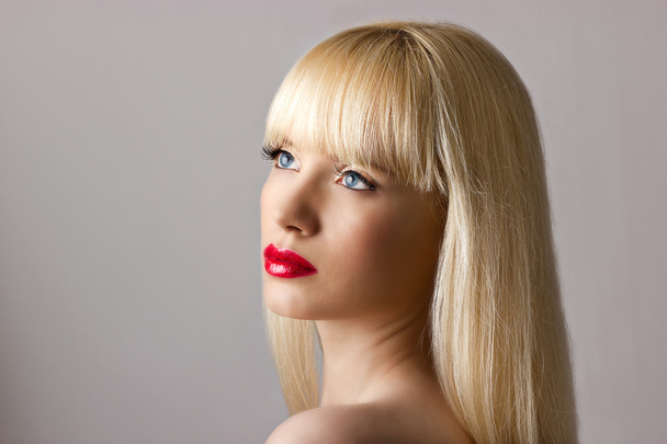 Blonde woman with red lips - 写真・画像