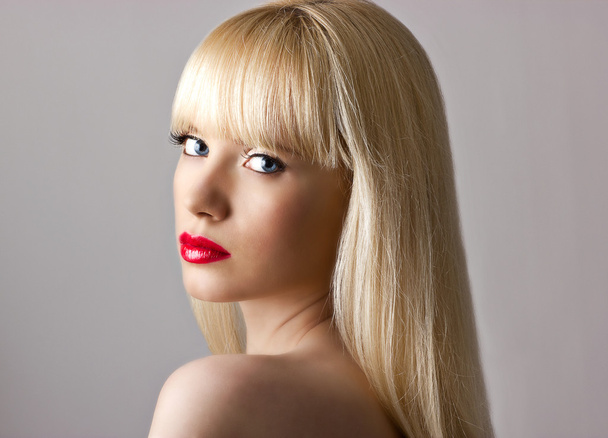 Beautiful blonde woman with red lips - 写真・画像