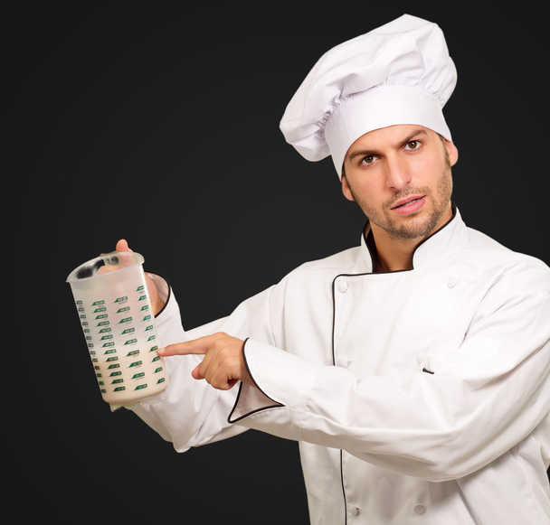 Portrait Of A Chef Holding A Jar - Foto, immagini