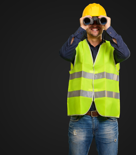 A Young Engineer Looking Through Binoculars - Zdjęcie, obraz