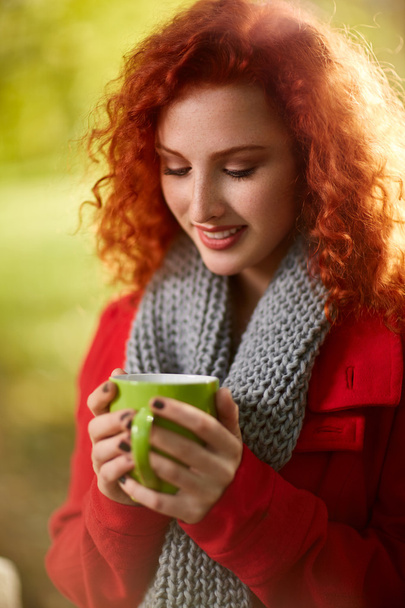 Female with cup of tea in nature  - Foto, Imagem