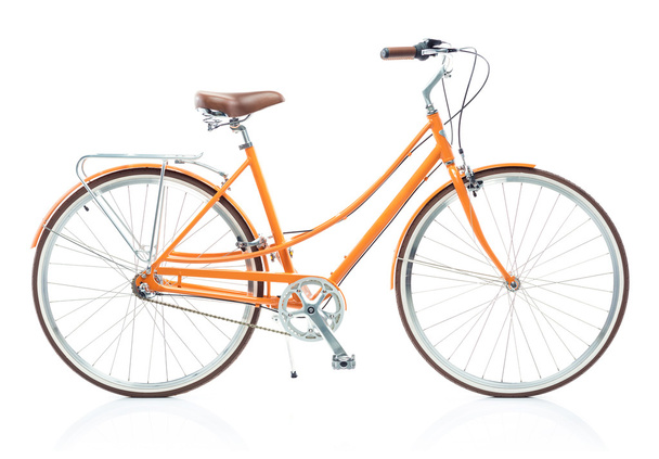 Elegante donna arancione bicicletta isolata su bianco
 - Foto, immagini