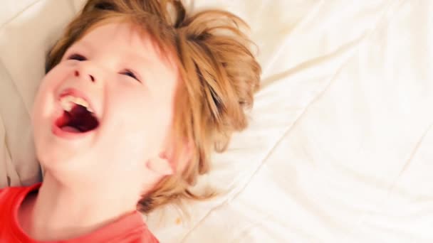 boy laughing a lot - Felvétel, videó