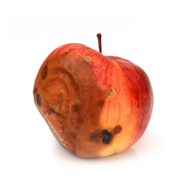 Czerwone jabłko zgniłe, naturalne tekstury - Zdjęcie, obraz