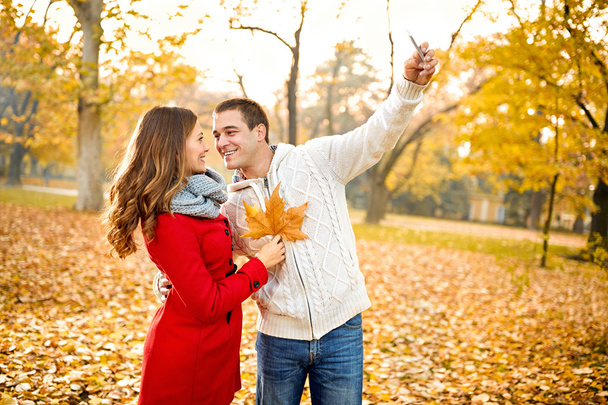 Couple taking selfie in forest  - Photo, Image