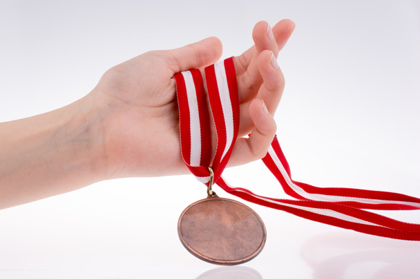 Hand holding medal - Photo, Image