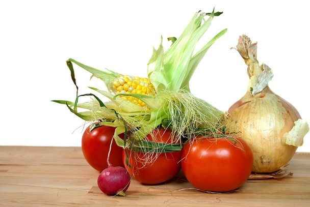 Свіжі овочі на обробній дошці
 - Фото, зображення