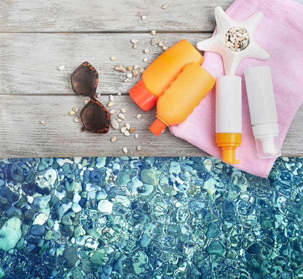 Summer beach set on swimming pool water background - Photo, Image