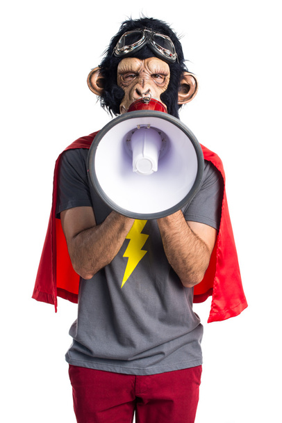 Superhéroe mono hombre gritando por megáfono
 - Foto, Imagen