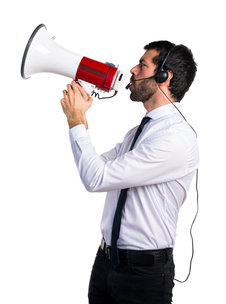 Handsome telemarketer man shouting by megaphone - Фото, зображення