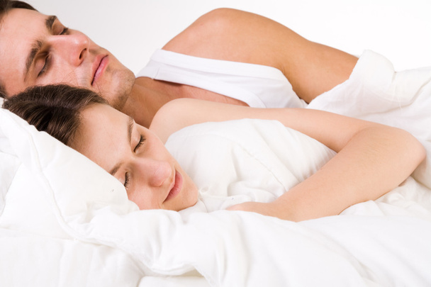 Young couple sleeping - Foto, imagen