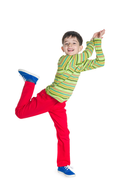 Cheerful little boy jumps - Fotoğraf, Görsel