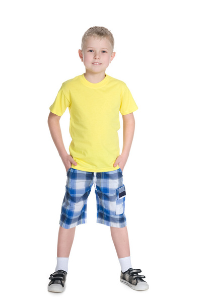 Blond little boy in a yellow shirt - Φωτογραφία, εικόνα