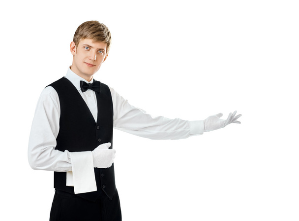 waiter gesturing welcome - Foto, immagini