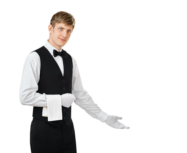 waiter gesturing welcome - Foto, afbeelding