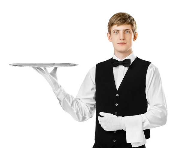 handsome waiter holding empty tray - Foto, Imagen