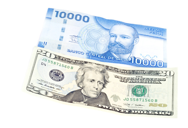 Húsz dollár számla, és elszigetelt fehér Chilei peso - Fotó, kép