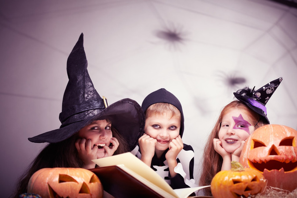 Three children in Halloween costumes  - Fotoğraf, Görsel
