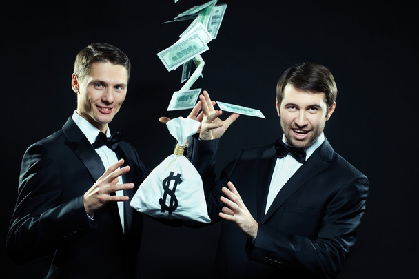 Les magiciens gagnent de l'argent s'envolent
  - Photo, image